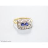 A 1930's/1940's 18ct & Pt, sapphire and diamond set shaped rectangular cluster ring, size M, gross