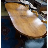 An Art Deco figured walnut extending dining table with one leaf, extends to 199cm, width 92cm