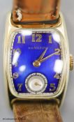 A gentleman's 1930's 14k gold filled Bulova manual wind wrist watch with blue enamel rectangular