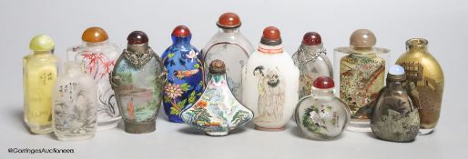 Eleven Chinese painted glass snuff bottles, a glass enamel one and another enamel one
