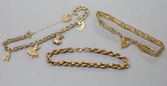 Three assorted modern 9ct gold bracelets, including charm and ropetwist,gross weight 23.6 grams.