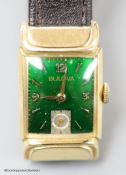 A gentleman's 1930's 10k gold filled Bulova manual wind wrist watch, with green enamel rectangular