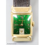 A gentleman's 1930's 10k gold filled Bulova manual wind wrist watch, with green enamel rectangular