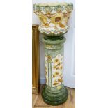 A Burmantofts faience jardiniere on pedestal, 105cm high