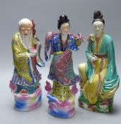 Three Chinese ceramic figures, late Qing, tallest 32cm