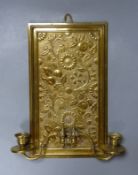 An Aesthetic period two-branch brass wall sconce, height 38cm