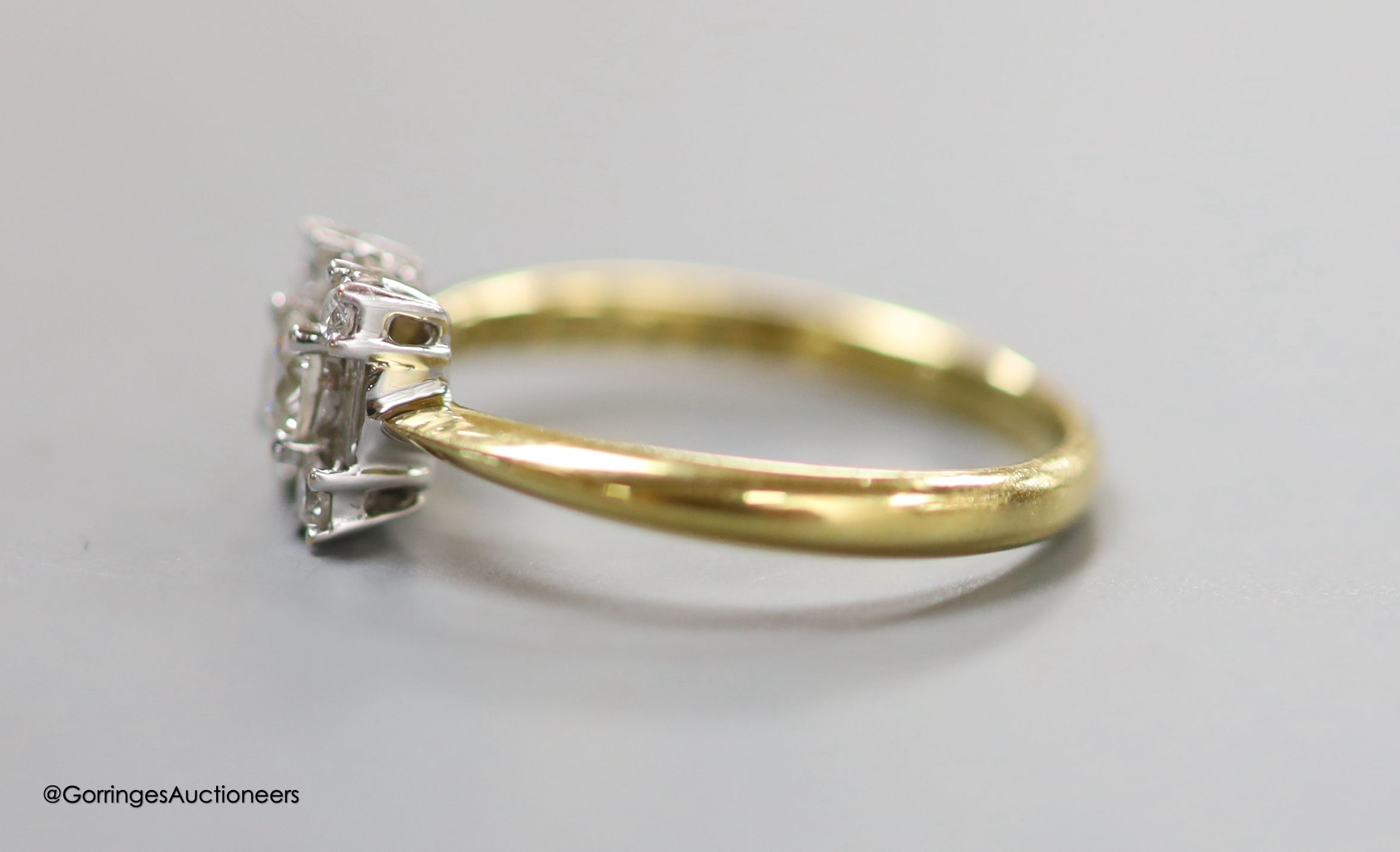 A modern 18ct gold, round and baguette cut diamond set square cluster ring, size N, gross 2.8 - Image 2 of 4