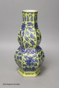 A Chinese underglaze blue yellow ground hexagonal vase, early 20th century, some restoration