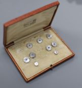 An early 20th century 18ct & Pt, mother of pearl and sapphire set octagonal part dress stud set (