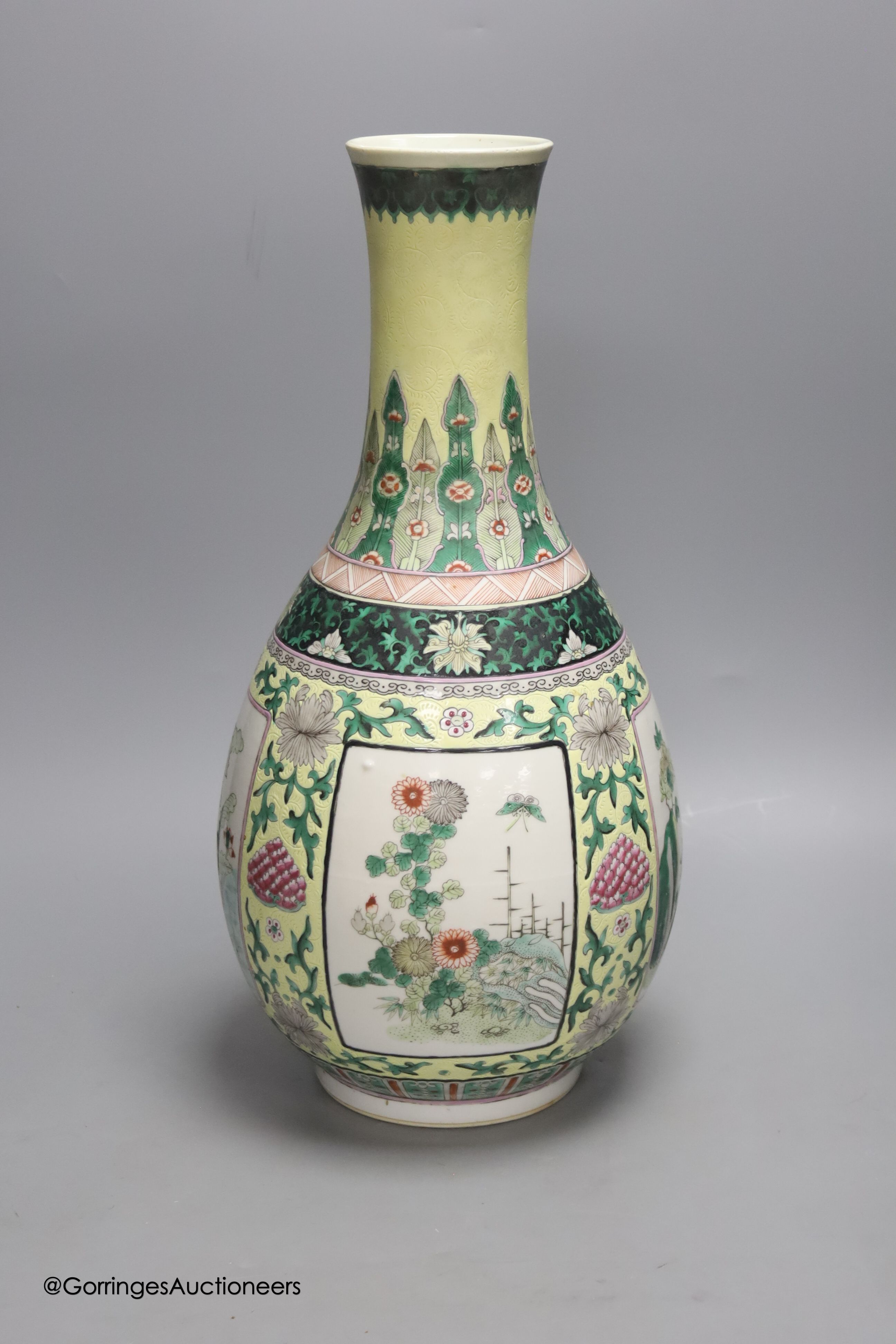 A large 19th century Chinese famille verte yellow ground bottle vase, height 47cm, restorations - Image 2 of 4