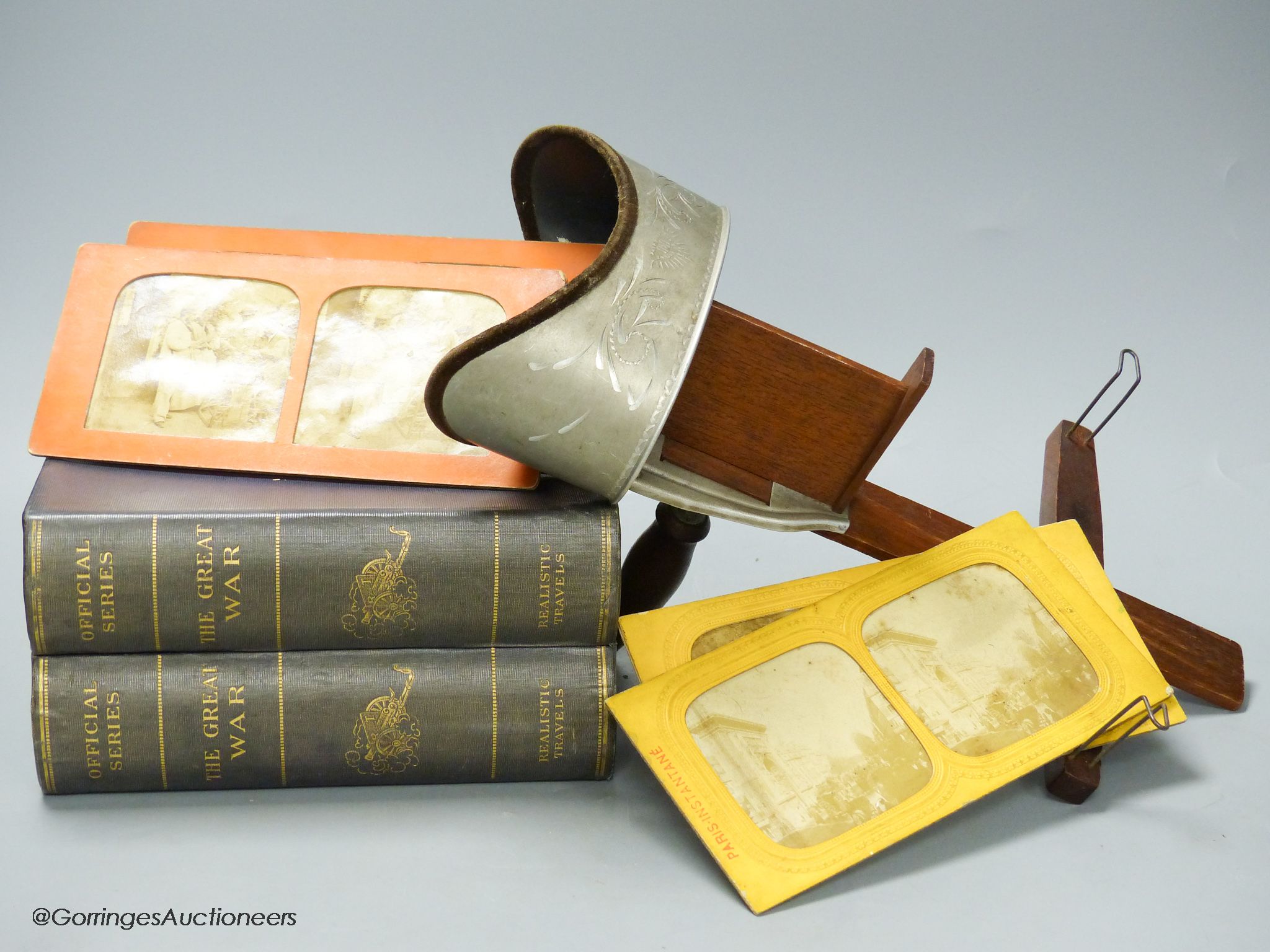 An Underwood & Underwood stereoscopic viewer, a collection of Realistic Travels 'The Great War'