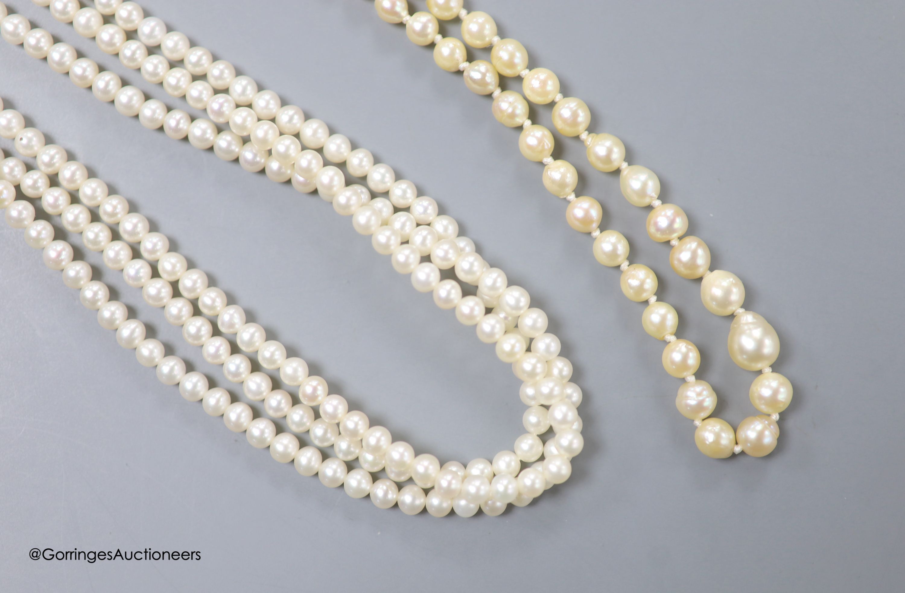 A triple strand cultured pearl choker necklace, with 375 clasp, 40cm and a single strand graduated