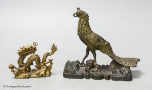 A 19th century Chinese bronze figure of a phoenix, repairs, and a 20th century Chinese bronze