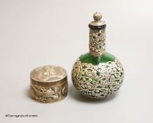 A late 19th/early 20th century Chinese Export white metal circular box, by Wang Hing, embossed with
