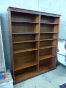 A reproduction mahogany open bookcase, width 152cm depth 30cm height 184cm