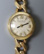 A lady's 1960's 9ct gold Jaeger LeCoultre manual back wind wrist watch, on associated 9ct gold curb