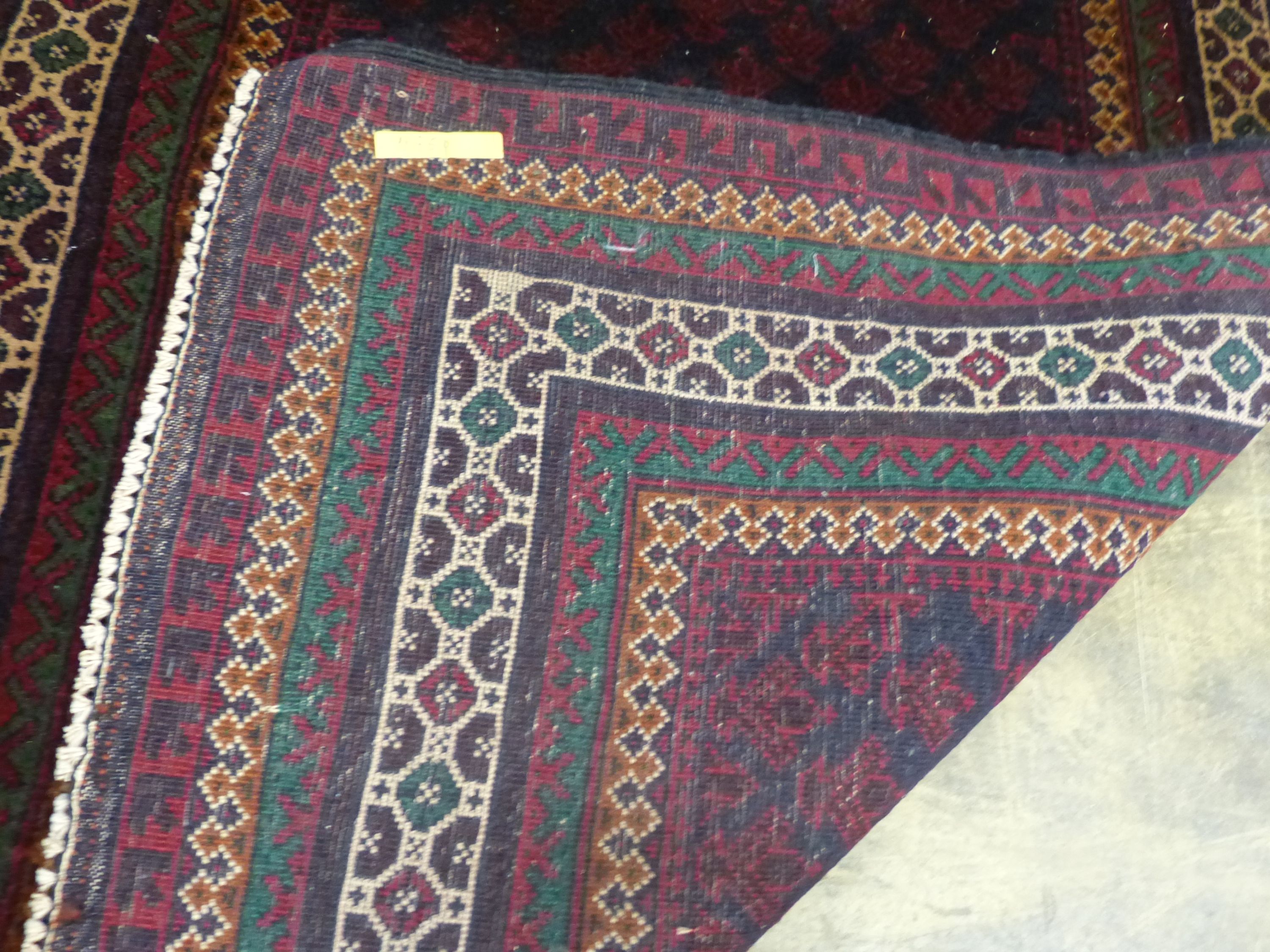 A Belouch red ground prayer rug, 146 x 90cm - Image 5 of 5