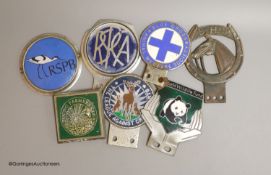 Seven various animal related car badges