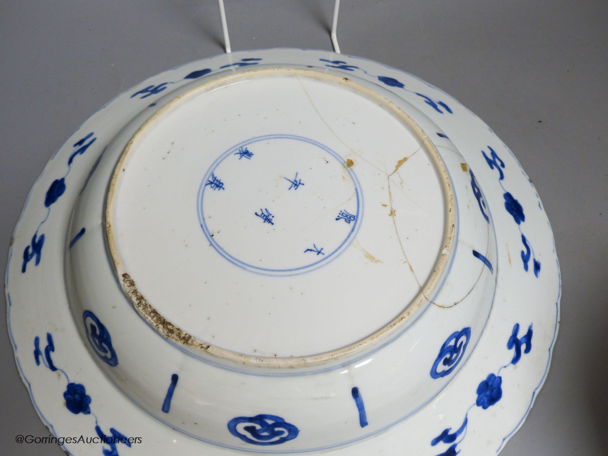 A Chinese blue and white dish, Kangxi mark and of the period, diameter 34cm, and a 19th century - Image 7 of 7