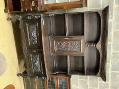 An 18th century style carved oak bow front dresser, length 136cm, depth 50cm, height 192cm