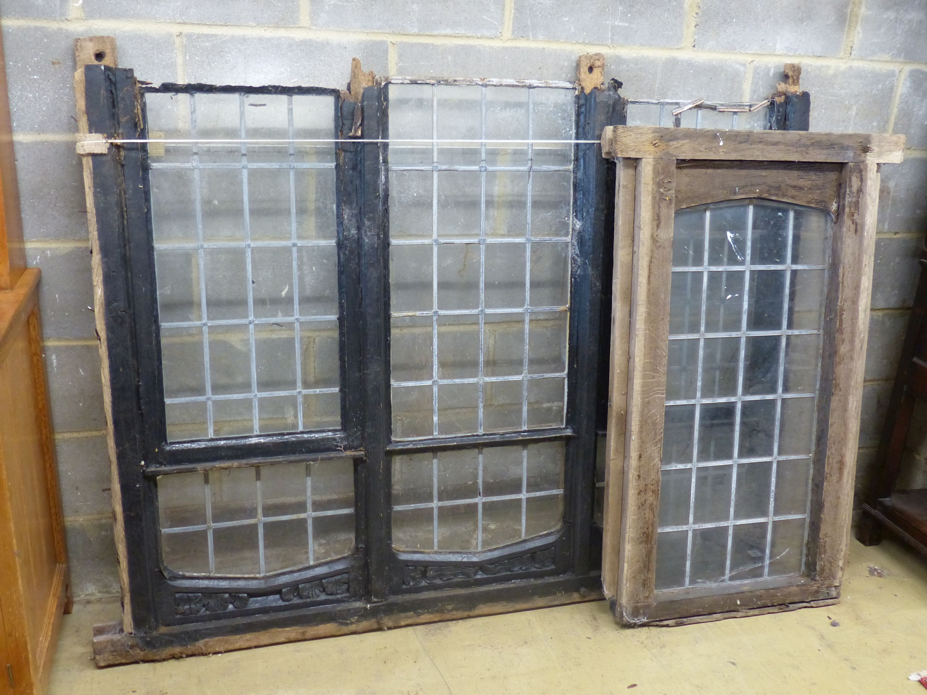 Three old carved oak window frames with leaded lights, largest width 170cm, height 134cm - Image 2 of 2