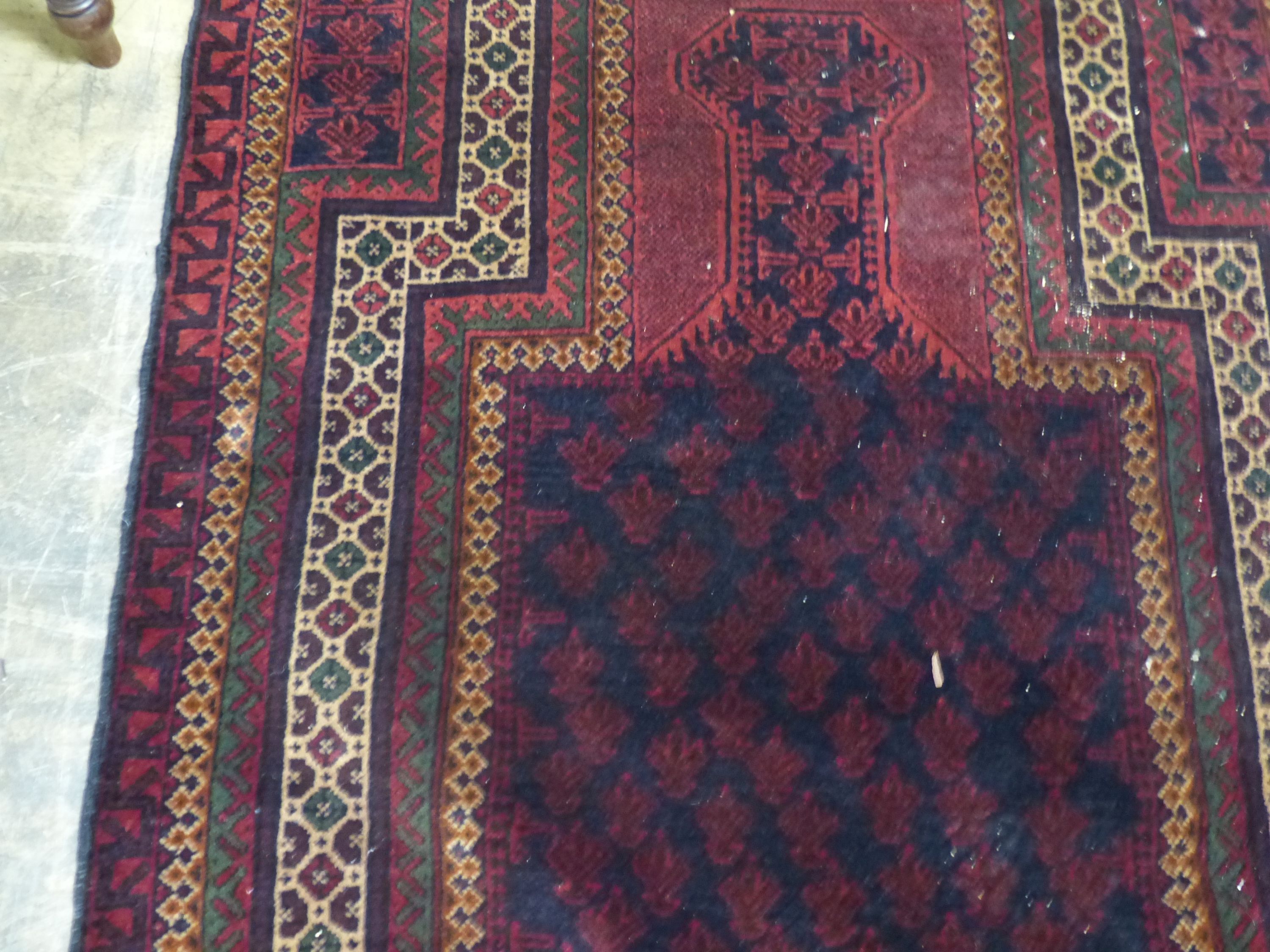 A Belouch red ground prayer rug, 146 x 90cm - Image 3 of 5