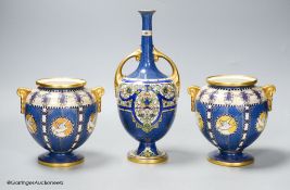A pair of Royal Worcester powder blue vases and another similar vase, height 23cm