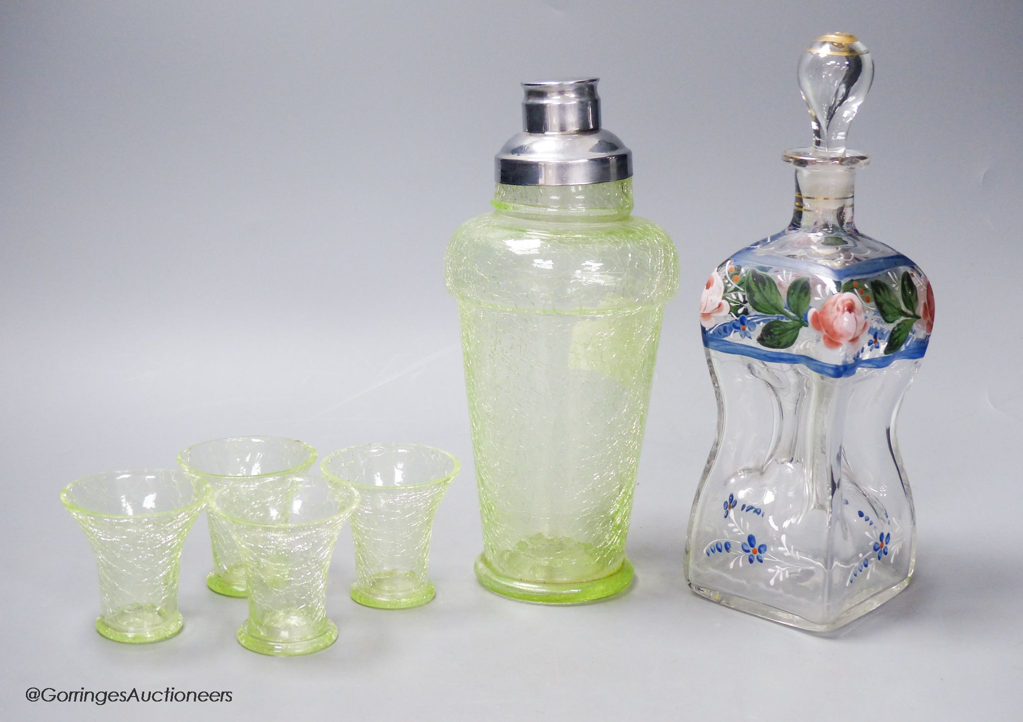 An Deco-style green crackle glass cocktail shaker, six tots and one other decanter