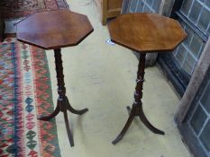 A pair of Regency style mahogany octagonal wine tableson ring-turned columns and tripod bases,