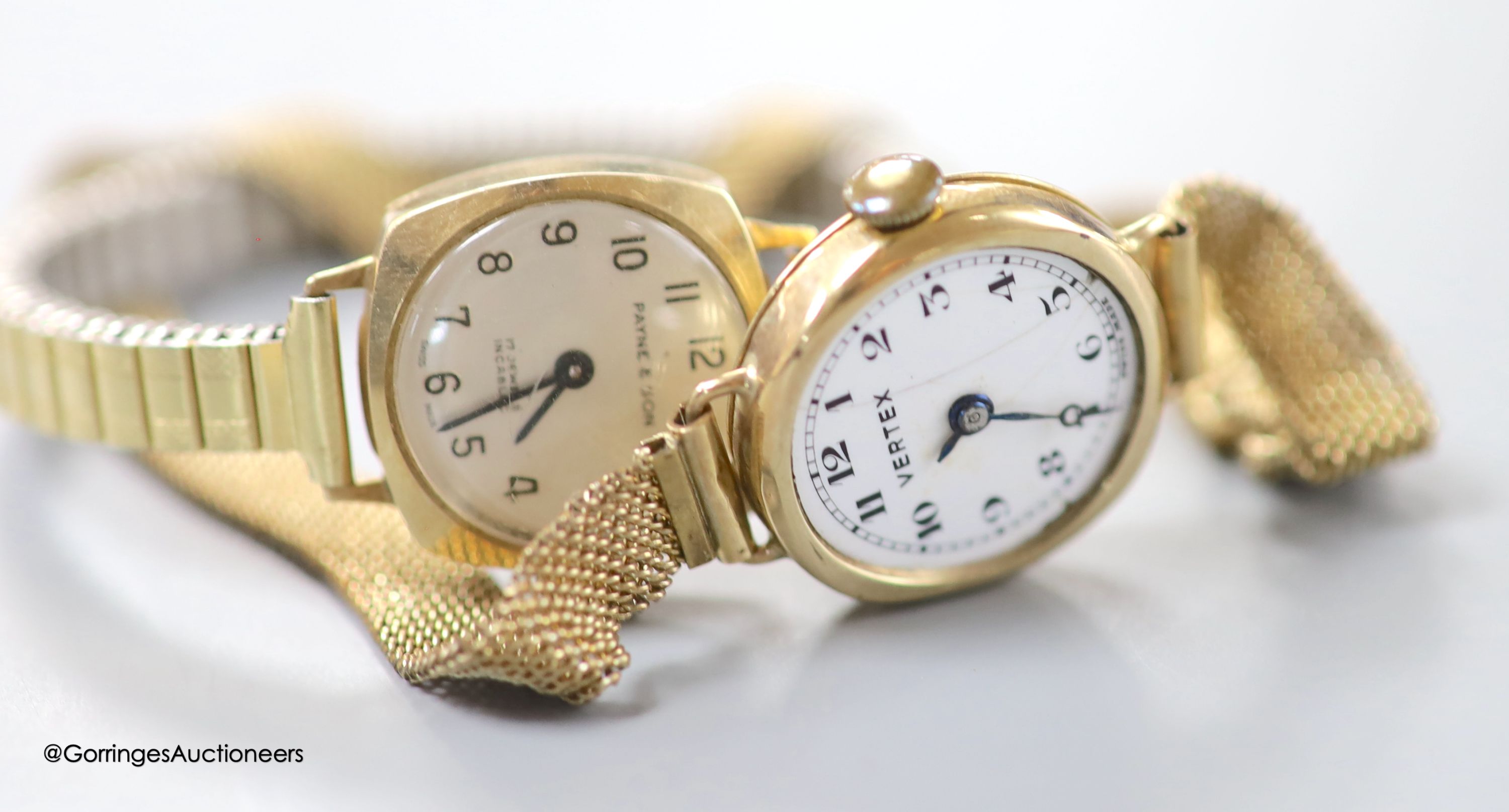 A lady's 9ct gold Vertex manual wind wrist watch, on a rolled gold mesh link bracelet and a similar