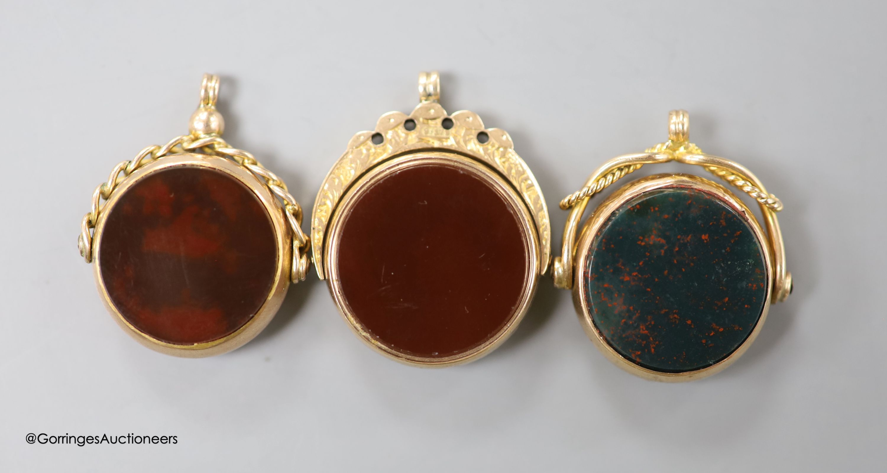 Three assorted late 19th/early 20th century 9ct mounted bloodstone and carnelian set swivelling fob - Image 2 of 2