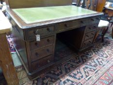 A Victorian mahogany/stained beech pedestal desk, length 138cm, depth 75cm, height 74cm