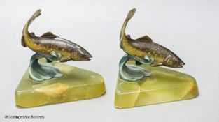 A pair of cold painted bronze fish bookends, on onyx bases, height 12cm