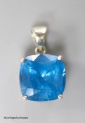 A white metal mounted square cushion cut blue topaz pendant,the stone measuring 13.9mm by 13.7mm