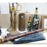 A pair of brass lamps, a dog handled umbrella, a shot casing, two display bottles of champagne etc
