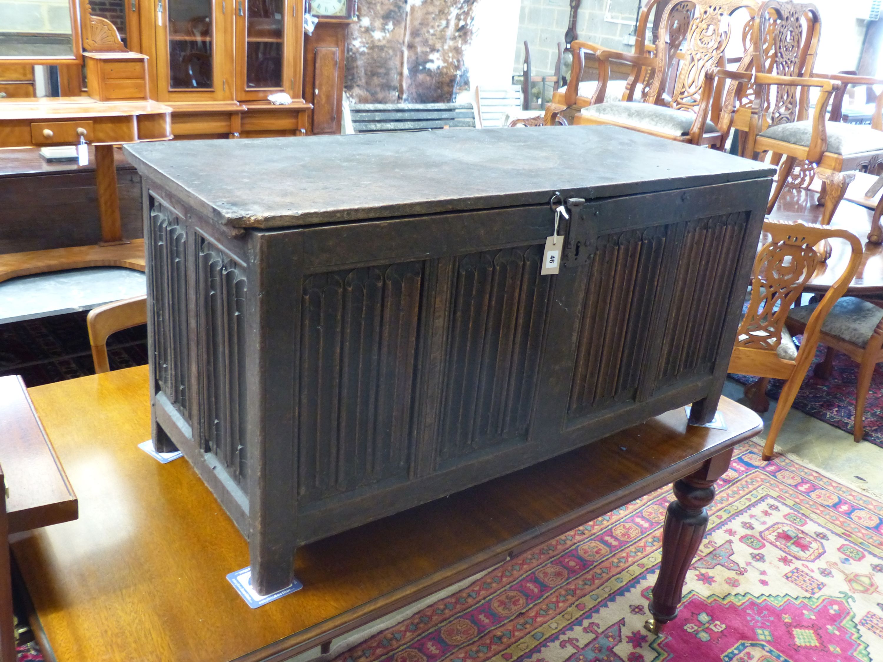 A carved and panelled oak chest, length 129cm, depth 51cm, height 63cm - Image 2 of 6