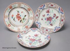 A pair of 18th century Chinese famille rose plates and another similar, largest diameter 22.5cm (