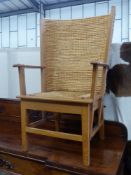 A 20th century light oak and skep work Orkney chair in traditional style, width 63cm, depth 60cm,