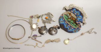 A white metal mounted beadwork purse and other minor jewellery, including Royal Navy sweethearts