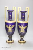 A pair of French gilt blue porcelain two handled vases, height 45cm