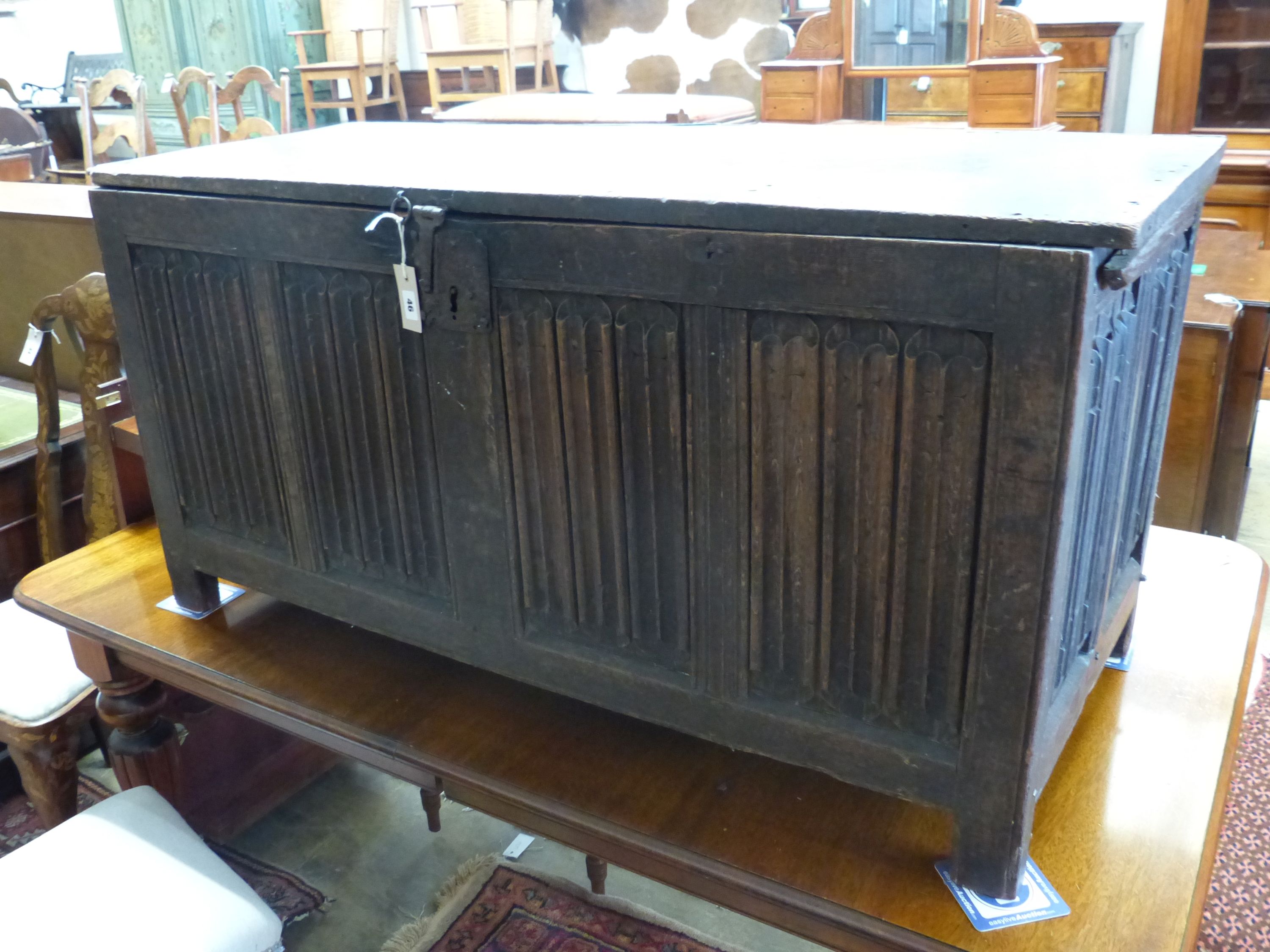 A carved and panelled oak chest, length 129cm, depth 51cm, height 63cm - Image 3 of 6