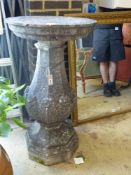 A reconstituted stone bird bathhaving acanthus-wrapped baluster-shaped column, 58cm diameter,
