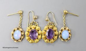 A pair of late Victorian yellow metal and amethyst set oval drop earrings, overall 24mm, and a pair