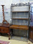 A reproduction leather mounted baker's rack, width 102cm depth 44cm height 206cm