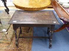 An early 20th century rectangular carved oak occasional table, width 75cm, depth 45cm, height 67cm