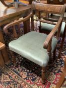 An associated set of six 19th century dining chairs in the Regency style, two with arms