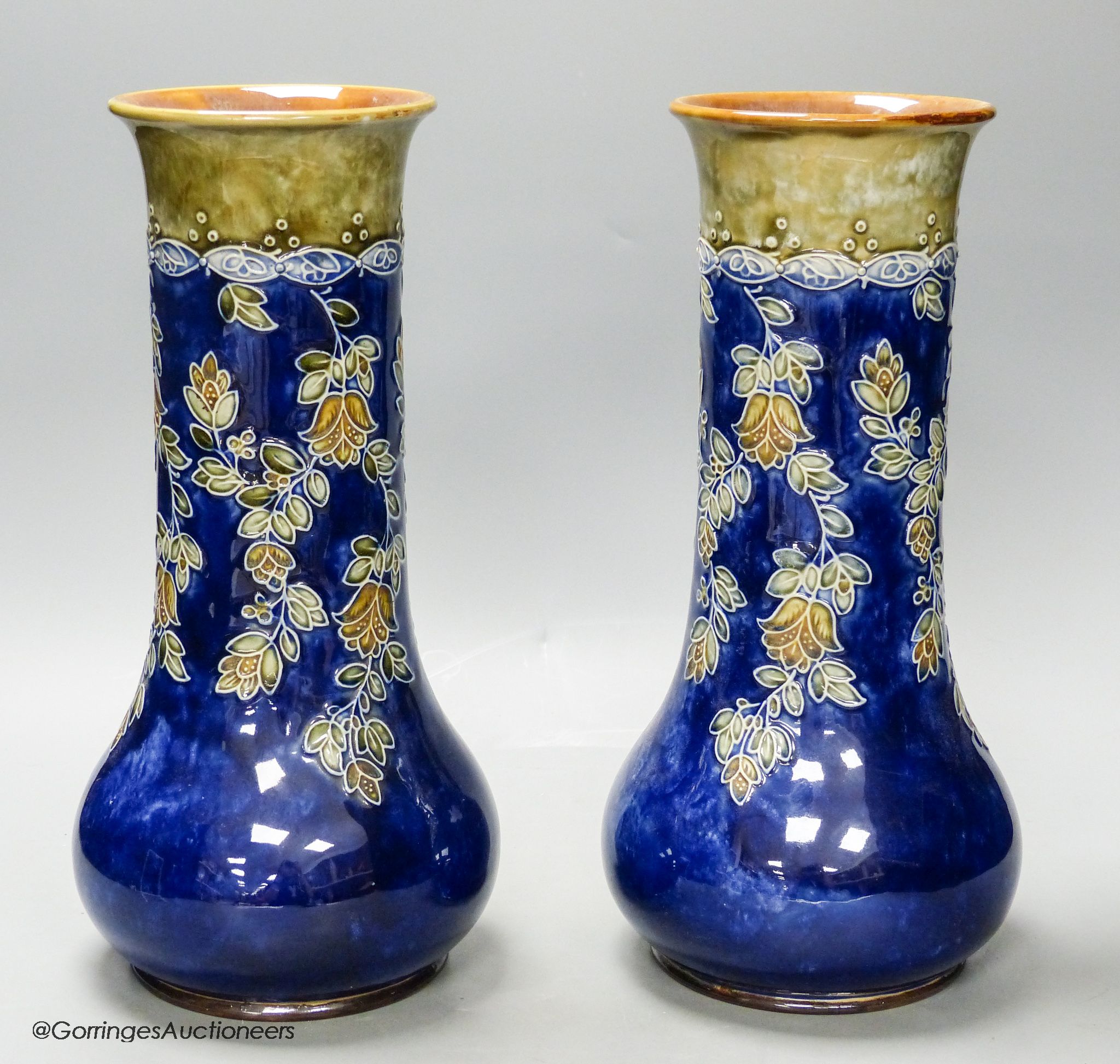 A large pair of Royal Doulton stoneware vases, height 33cm