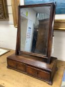 A George III mahogany two drawer box base toilet mirror, width 46cm, depth 23cm, height 62cm