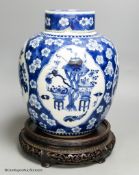 A Chinese blue and white 'Hundred Antiques' jar, Kangxi mark, c.1900