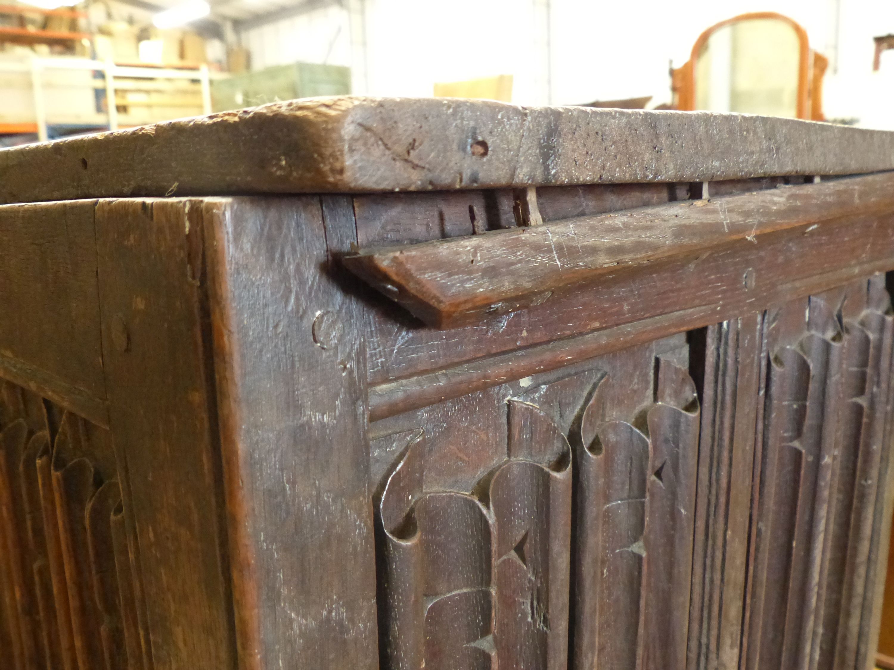 A carved and panelled oak chest, length 129cm, depth 51cm, height 63cm - Image 4 of 6